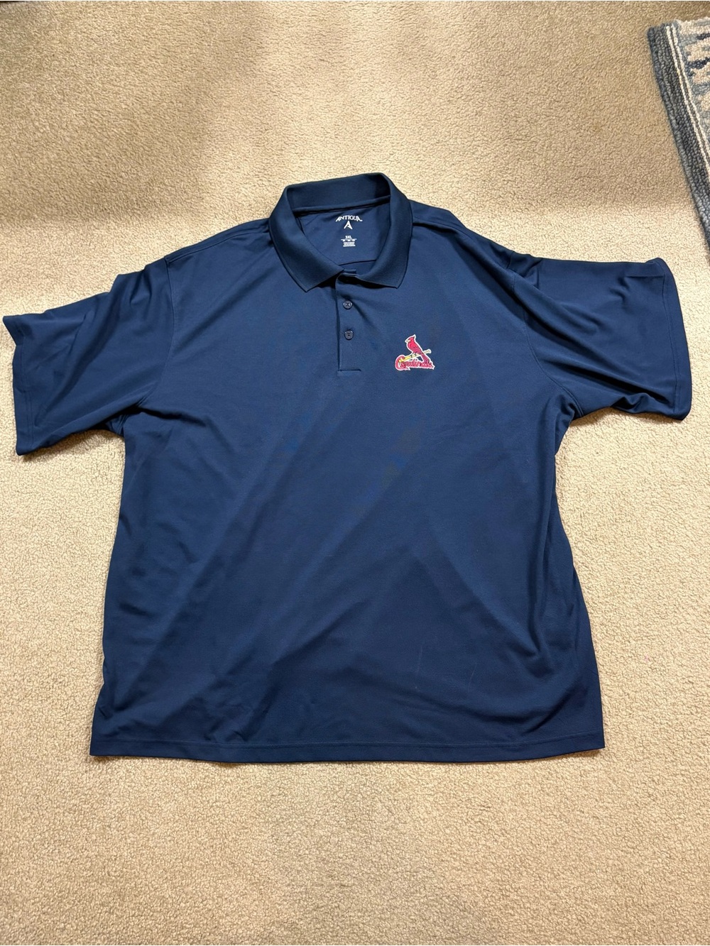 Antigua Men’s Navy Polo with Red St. Louis Cardinals Patch